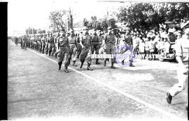Kontingen peleton dari Pertahanan Sipil dalam pawai peringatan HUT Kemerdekaan Republik Indonesia...